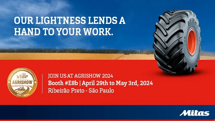 Mkitas at Agrishow poster with a tyre and a bluew sky with red underneath