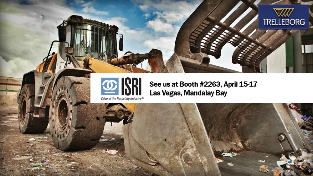 Image of a digger with Trelleborg Brawler tyres fitted, with a white box infront with the line 'IRSI. See us at booth #2263 April 15-17 Las Vegas, Mandalay Bay' written on top of it.