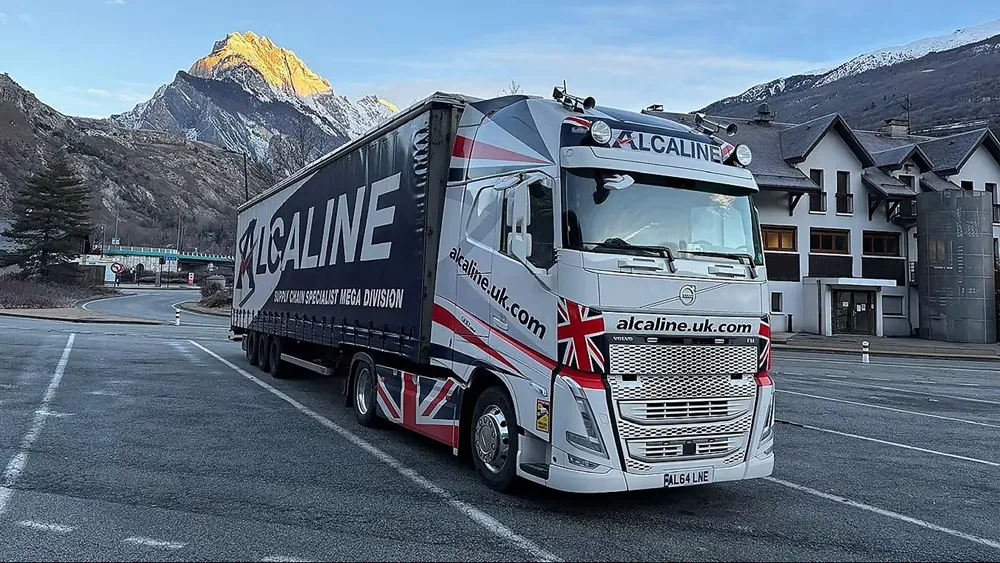 Image of an Alcaline Truck parked on a road